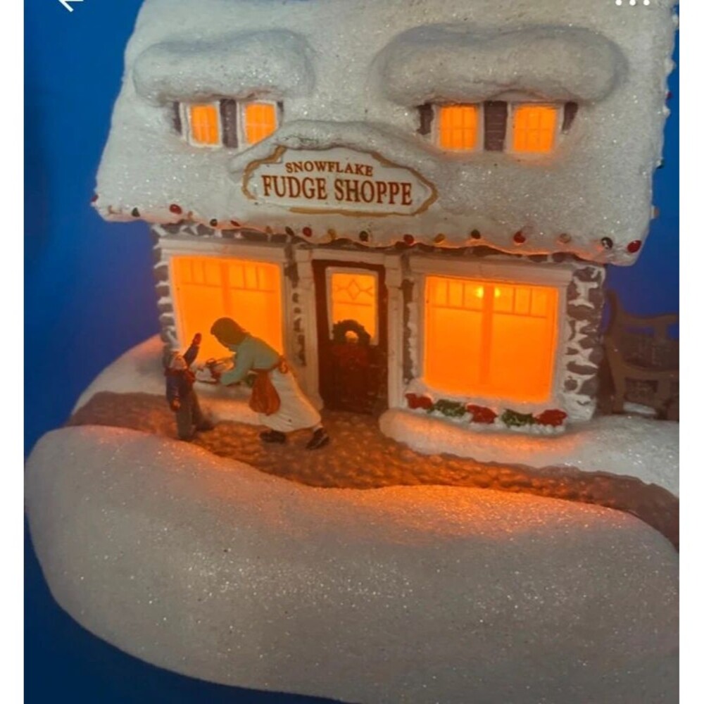 Thomas Kincaid illuminating fudge shop